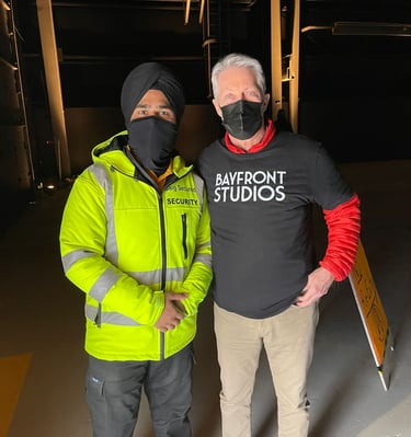 Security Guard and a Building Owner taking a picture together