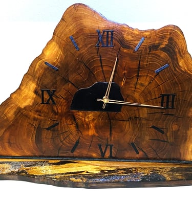 Edged wooden slab clock for table or shelf.