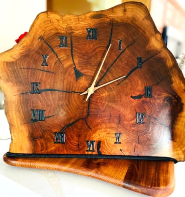 Edged wooden slab clock for table or shelf.