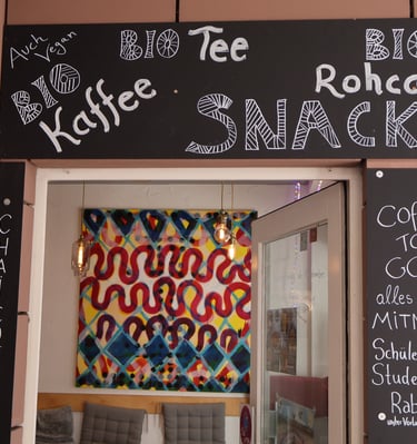 a sign that says coffee shop