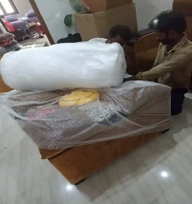 Professional sofa packing with bubble wrap by Seemanchal Packers & Movers for safe house shifting