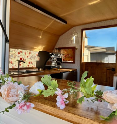 Love & Lattes Mobile vintage trailer interior at an outdoor event near Greeley, Colorado