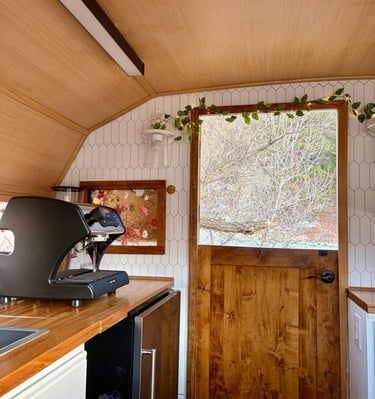 Love & Lattes coffee trailer serving guests at community celebration