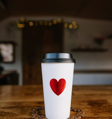 Love & Lattes Mobile serving drinks with love in vintage coffee trailer 