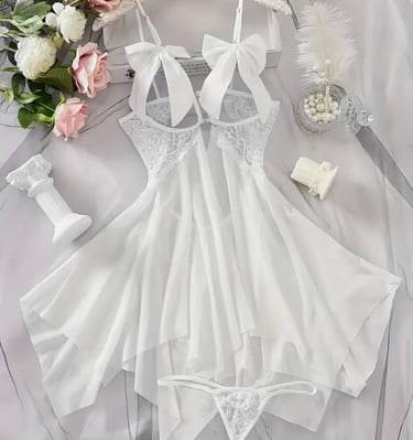 a white dress with a white dress and a bouquet of flowers