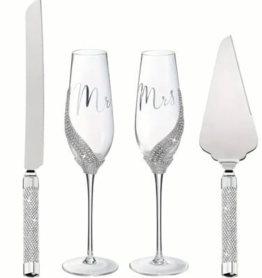 a couple of wine glasses and a knife and knife