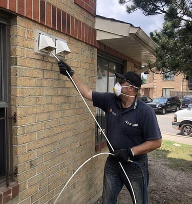 technician cleaning dryer vent