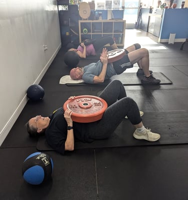 glute press with weighted plates