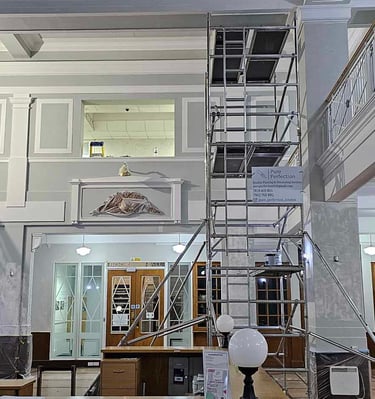 Interior commercial painting project in Croydon with scaffolding, carried out by Pure Perfection