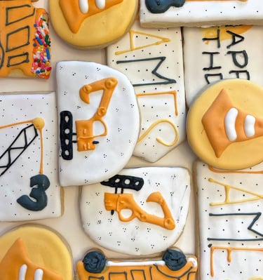 construction themes custom designed sugar cookies for a young boy's birthday