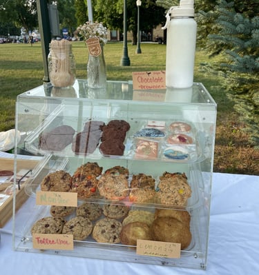 many assorted delicious baked goods in a case baked fresh daily