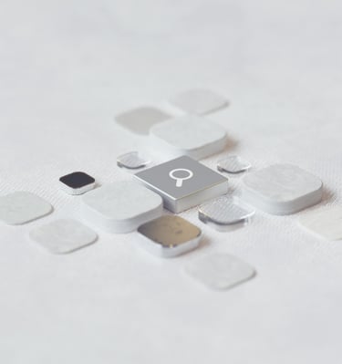 Keyboard keys on a white background, the central one featuring a magnifying glass search icon