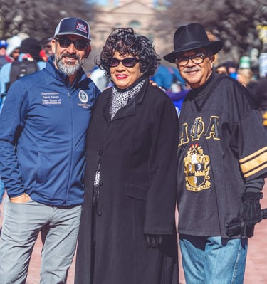 a group of people standing in a park for GFW MLK Jr. Community Event