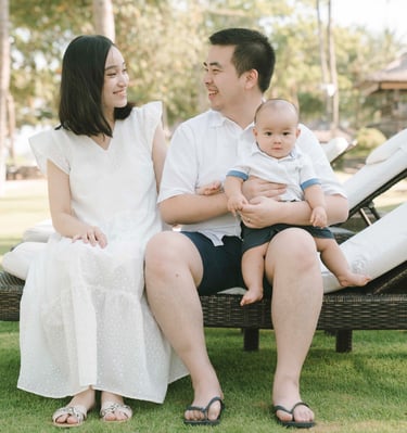 Young family portrait with baby at InterContinental Bali Resort Jimbaran