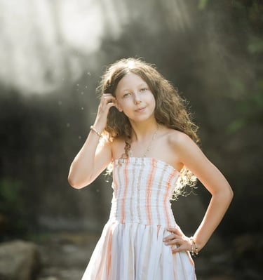 Daughter portrait during a family photography session at Umbul Sari Water Garden in Ubud Bali