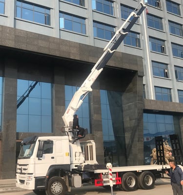 a crane truck with a 16-ton 4-section arm knuckle boom.