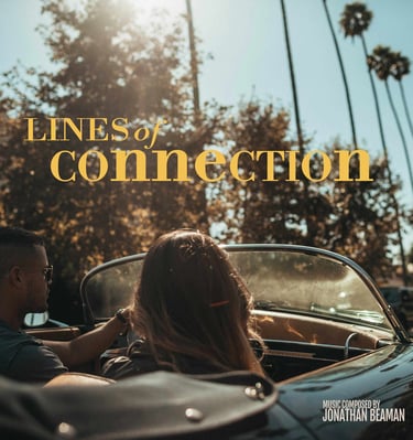 a couple sitting in a convertible car