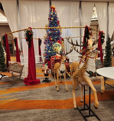 a christmas tree with reindeer and reindeer decorations