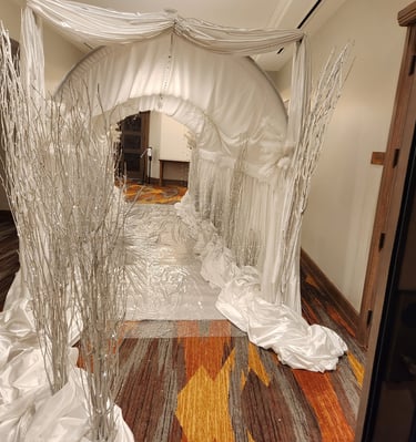 a room with a white canopy tent with a canopy over it