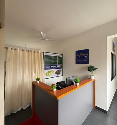 a reception desk with a red carpet and a red carpet