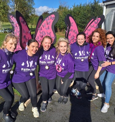 Group of runners dressed as butterflies for their annual Butterfly Foundation fundraiser race