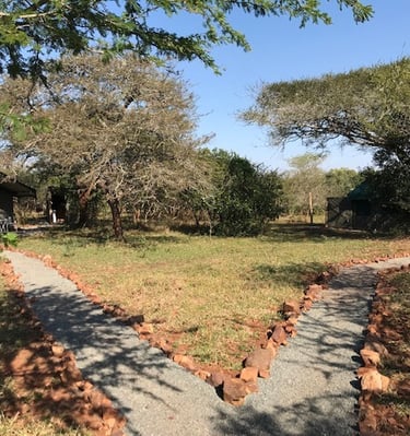 En suite safari tent sites with private kitchens at Albizia tented camp in Hluhluwe