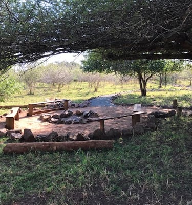 Firepit braai area for self catering glamping tents at Albizia camp in Hluhluwe