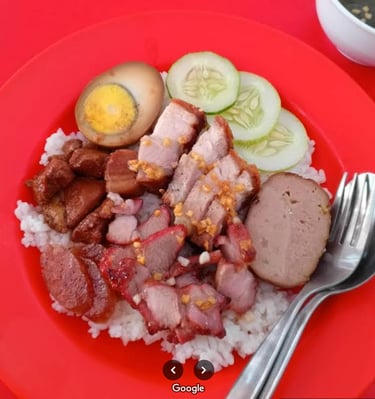 a plate of food with a fork and a fork