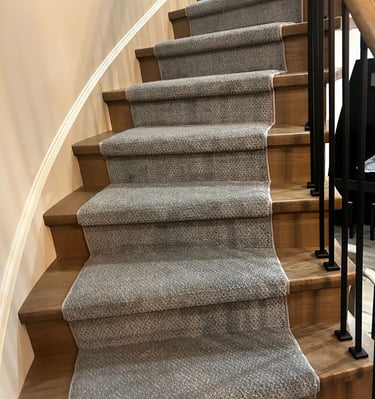 Grey pattern carpet runner installed on hardwood stairs – stylish and durable stair runner in London Ontario home