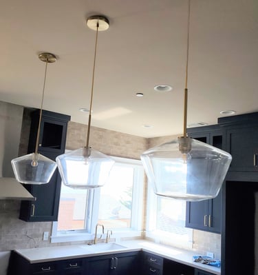 Custom kitchen island lighting. Modern kitchen renovations in Colorado Springs