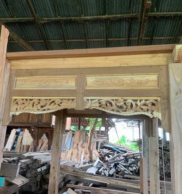 Restoration process of antique Joglo structure preserving original teak wood while preparing for modern installation