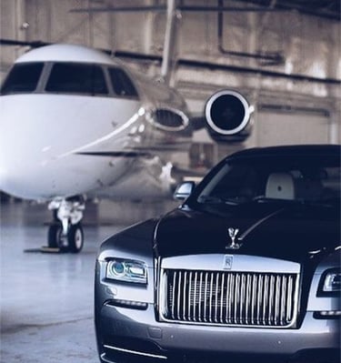 a car parked in a garage with a jet plane