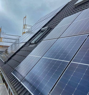 a solar paneled roof with solar panels and a crane