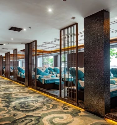 a restaurant with a long row of seating seating