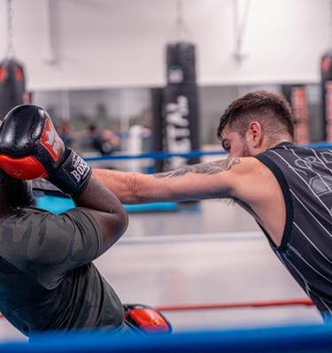 Boxeur qui esquive un coup de poing
