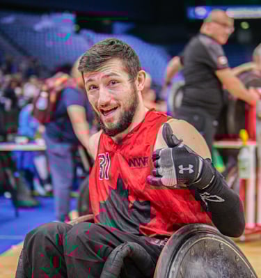 Joueur du canada qui nous fait un signe de la mains après le match
