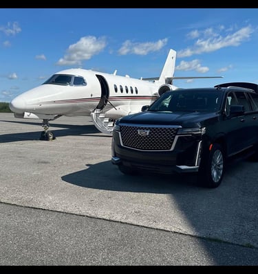 Emilios limo parked on the tarmac of a private jet