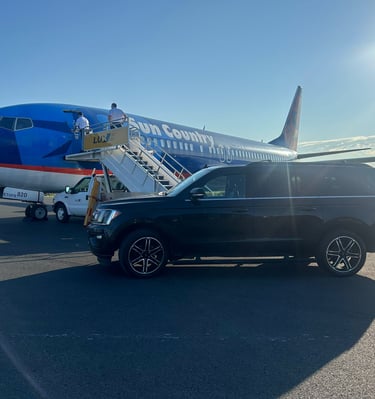 emilios Limo parked on the tarmac at an airport