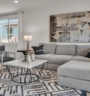 a living room with a couch and a couch