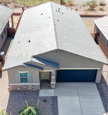 a house with a garage door and a garage door