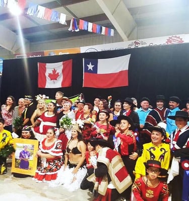 A group of people in Chilean costumes.