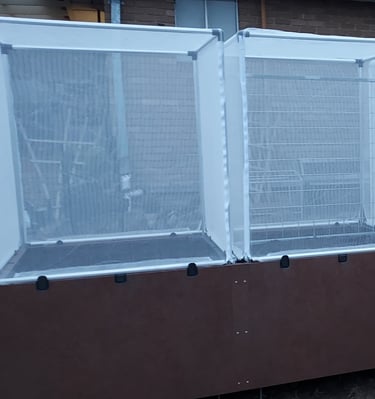 2 Foodcubes with metal cladding and nets installed by Vegiecube