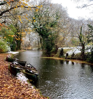 A winter view of canoes on the Monmouthshire and Brecon canal near Bridge 76 Adventures