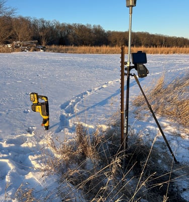 Property corner located in frozen ground