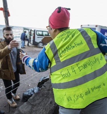 This is in the early winter morning circa 2015 serving tea to volunteers setting up the camp for the