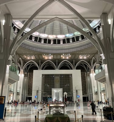 Interior of the Iron Mosque in Malaysia, showcasing modern Islamic architecture and serene ambiance
