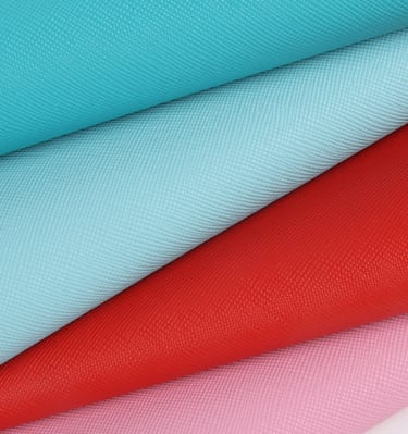 Colorful PU and vegan leather options, offering a luxurious feel for premium bags.