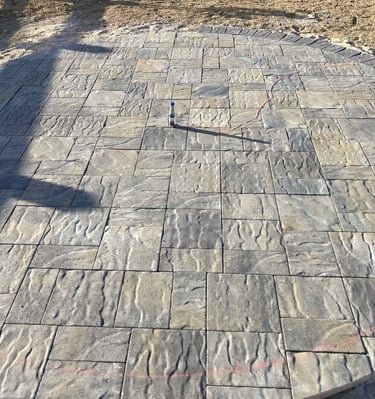 Circular Textured  Blue moon stone patio with a gas line for incoming fire pit