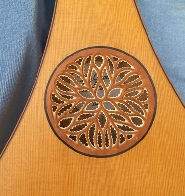 Gittern rose in pearwood and parchment