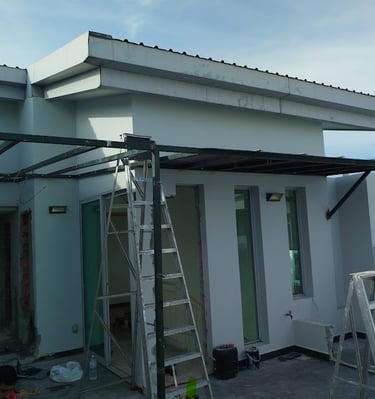 Professional installation of a metal frame awning on a residential rooftop terrace.